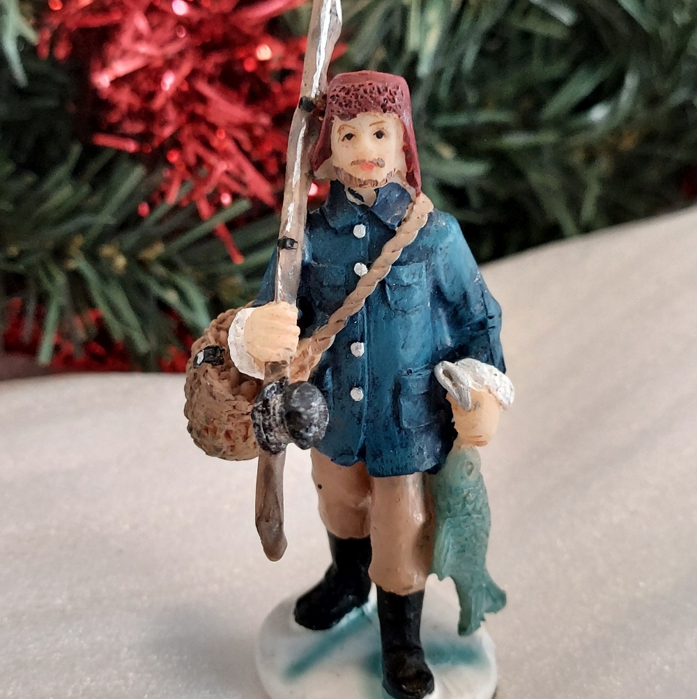 Man Holding Fishing Rod Christmas Village Figurine